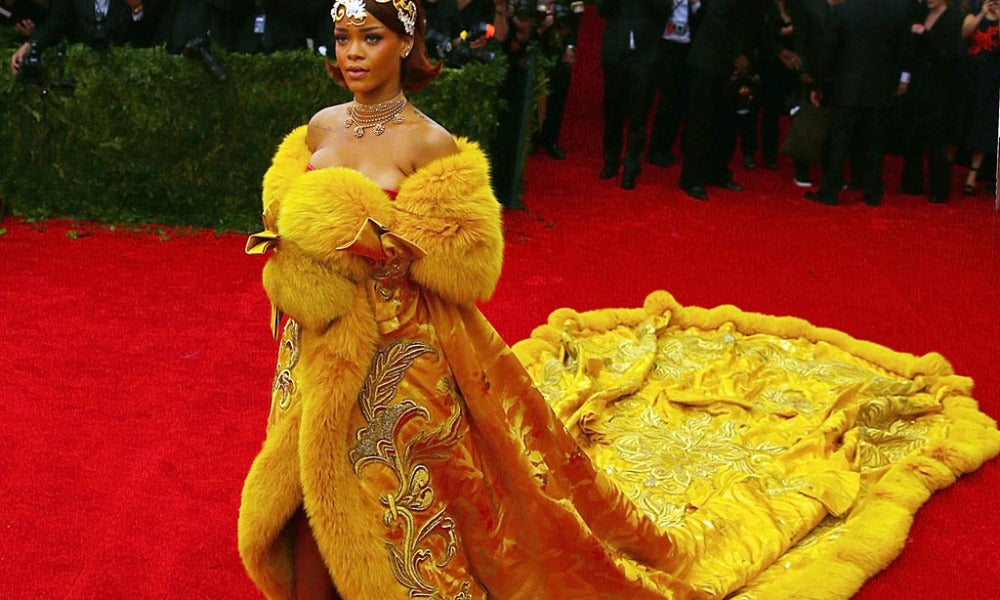rihanna omelette dress designer Rihanna Felt Like A 'Clown' Wearing Her Notorious 'Omelet' Met Gala Gown
