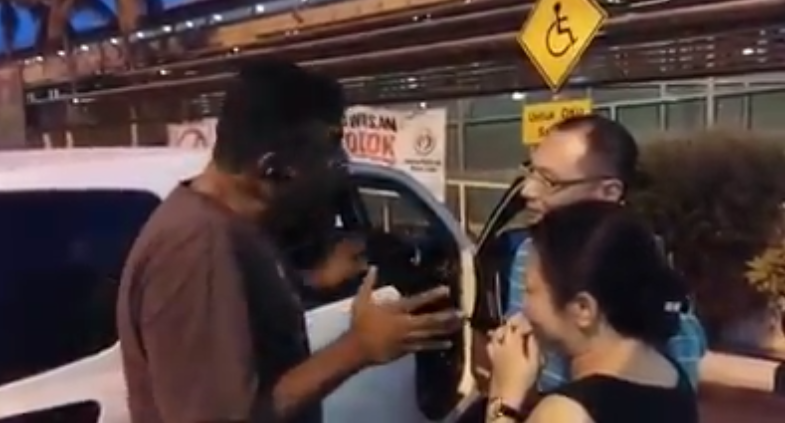 Video Of Malaysian Man Scolding Singaporean Couple For Parking In Handicapped Spot Goes Viral - World Of Buzz