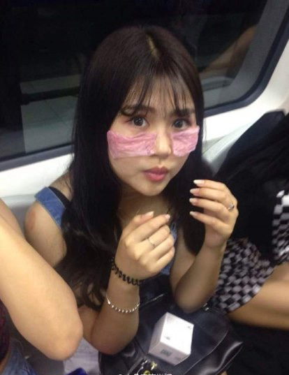 Chinese Models Rides Train With Condoms On Their Face For 'Beauty' - World Of Buzz 1