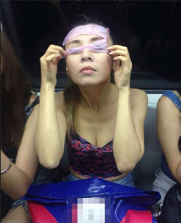 Chinese Models Rides Train With Condoms On Their Face For 'Beauty' - World Of Buzz 3