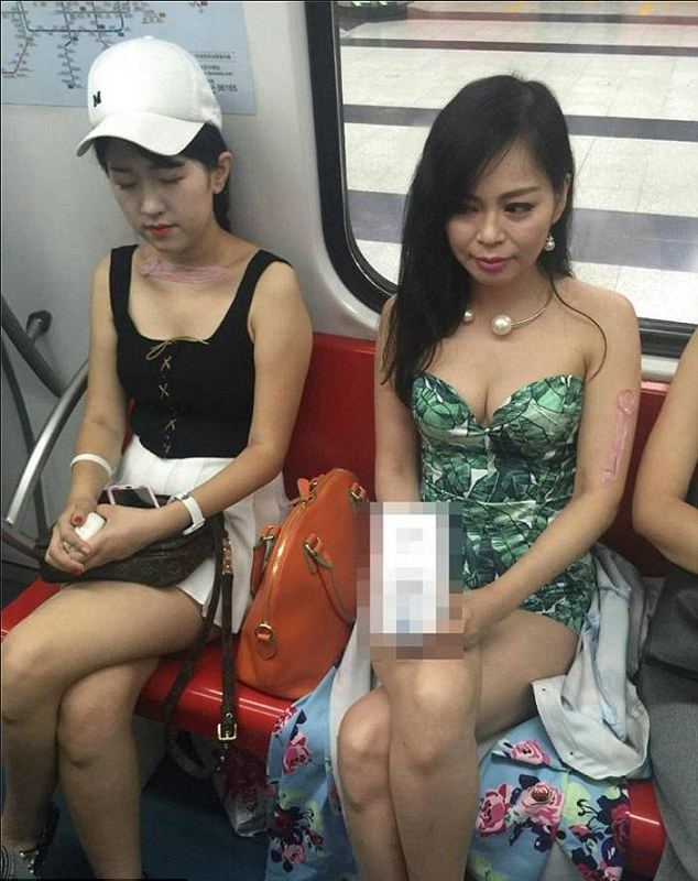 Chinese Models Rides Train With Condoms On Their Face For 'Beauty' - World Of Buzz 4