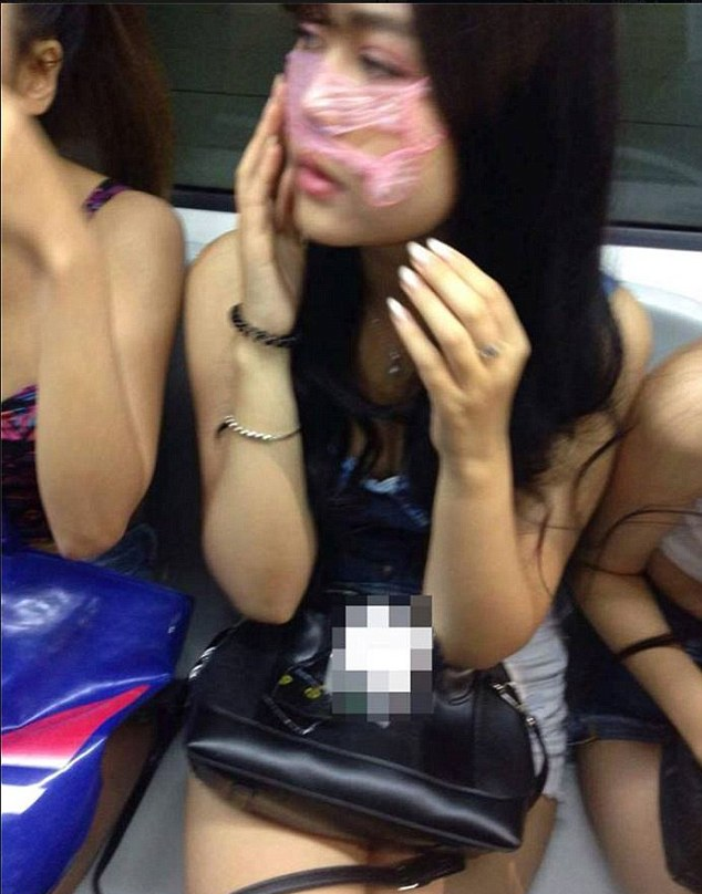 Chinese Models Rides Train With Condoms On Their Face For 'Beauty' - World Of Buzz 5