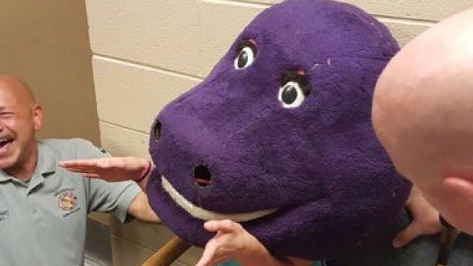 Prank Gone Very Wrong When Teen Traps Herself In Huge Barney Head - World Of Buzz 2