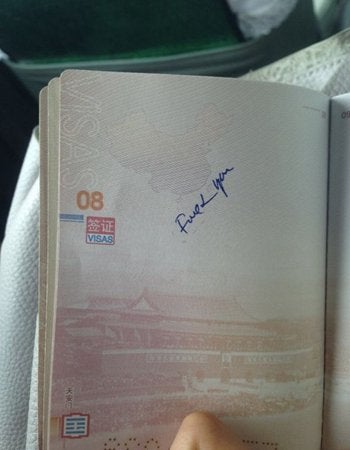 Chinese Woman Receives Back Her Passport With A 'Fuck You' Written By Vietnamese Custom Officers - World Of Buzz 1