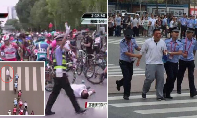 Oblivious Man Strolls Right Into A Cycling Race And Causes Epic Crash - World Of Buzz