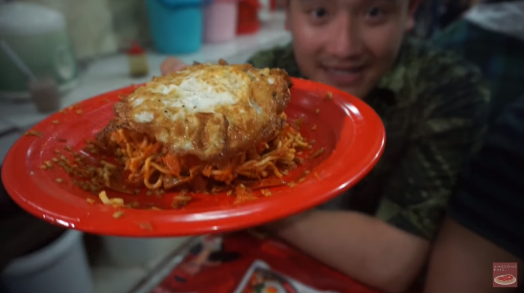 YouTuber tries the Spiciest Noodles on planet earth and goes Berserk - World Of Buzz