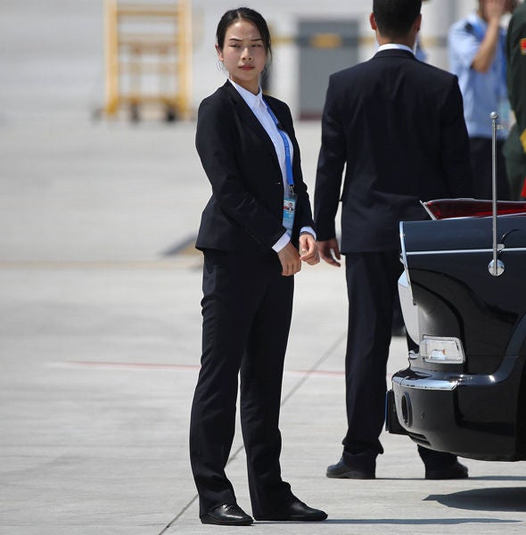 Check Out The Female Chinese Bodyguard That Becomes An Internet Sensation - World Of Buzz 2