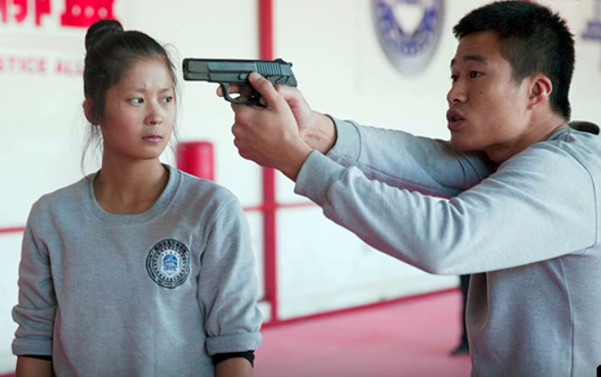 Check Out The Female Chinese Bodyguard That Becomes An Internet Sensation - World Of Buzz