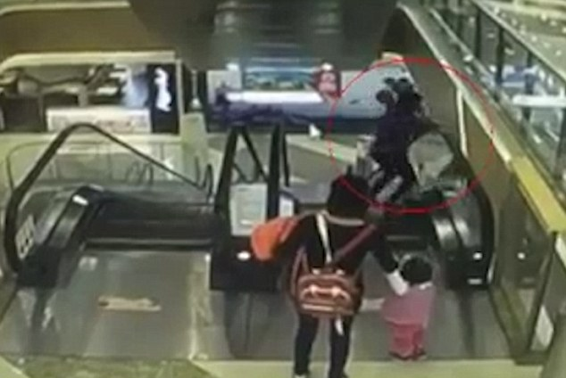 Chinese Baby Accidentally Dropped 3 Floors Down To His Death From Escalator - World Of Buzz 1