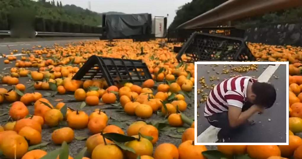 Chinese Man Cries As Villagers Steal His Oranges After His Lorry Overturned. - World Of Buzz 7