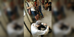 Elderly Man Forced To Sit on Train Floor After No One Offered Him A Seat - World Of Buzz 2