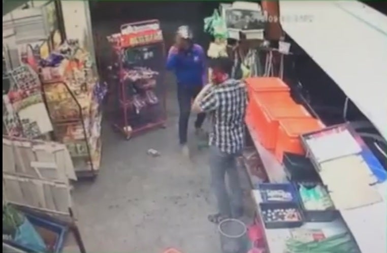 Hero Shopkeeper Defends Local Sundry Shop From Two Robbers With Machetes - World Of Buzz 3