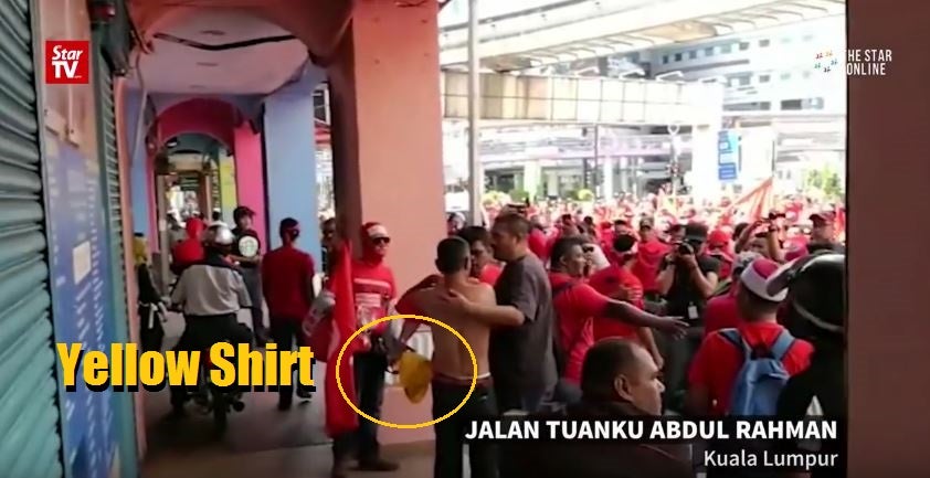 Red Shirts Forces Elderly Man Who Supports Bersih 5 To Put On Red Shirt - World Of Buzz