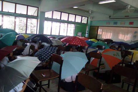 Teacher Asks Students To Open Umbrella To Prevent Cheating During Exam - World Of Buzz 2