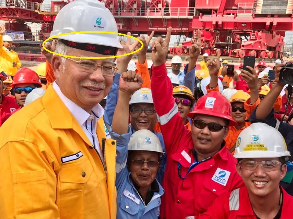 The Internet Is In A Ruckus Over How Najib Wore His Safety Helmet Wrongly - World Of Buzz 2