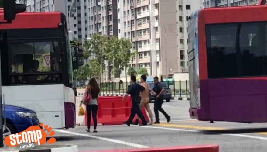 Bizarre Naked Man Arrested On Bus In Singapore - World Of Buzz