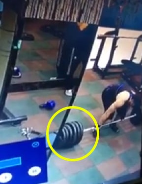 Buff Guy Collapses On The Floor After Lifting Too Heavy In The Gym - World Of Buzz