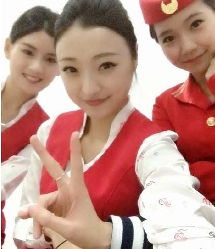 Chinese Flight Attendant Discovered Performing Oral Sex On A Man During Flight - World Of Buzz