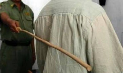 Corrupted Civil Servants Should Be Punished By Being Caned, Officials Said - World Of Buzz 4
