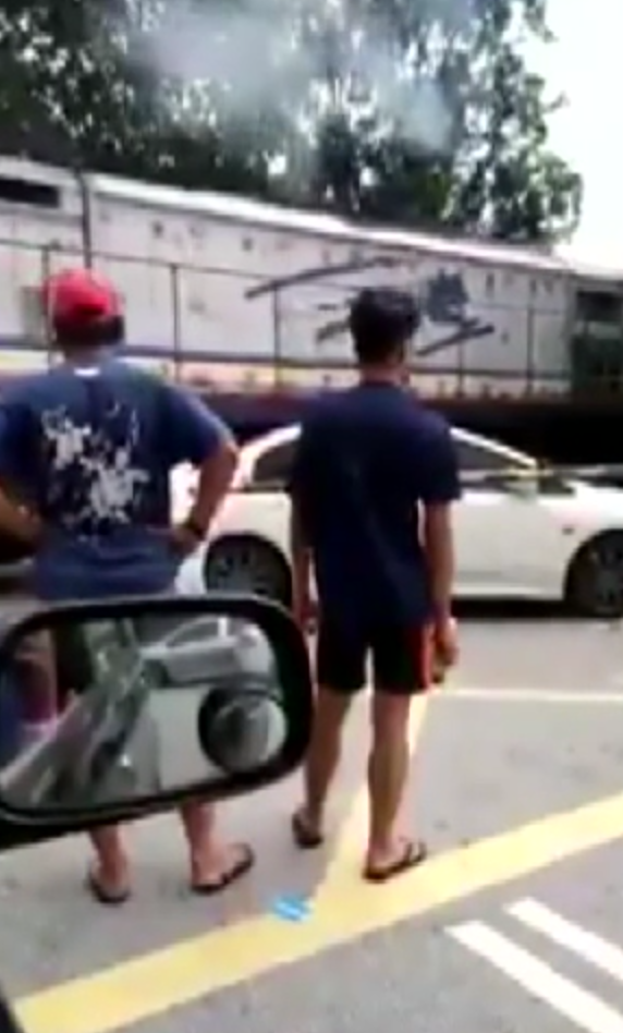 Malaysian Driver Illegally Parks Car Next To Train Tracks, Whole Bumper Gets Torn Off - World Of Buzz 1