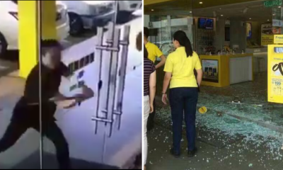 Angry Man Wreaks Havoc And Smashes Glass Panels At Digi Store Because Internet Is Slow - World Of Buzz