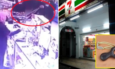 Cctv Footage Reveals Man Robbing 7-Eleven 'Shoots' Worker With A Slingshot - World Of Buzz
