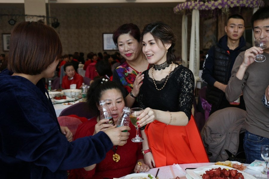 Chinese Coal Miner Marries Russian Girl Who Says She Doesn't Need a Car or House - World Of Buzz 1