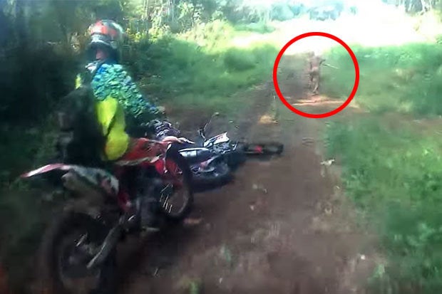 Mysterious Figure Spotted By Biker Spark Huge Debate. - World Of Buzz