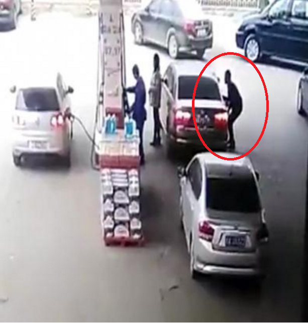 Thief Steals Valuables At Petrol Station Sneakily - World Of Buzz
