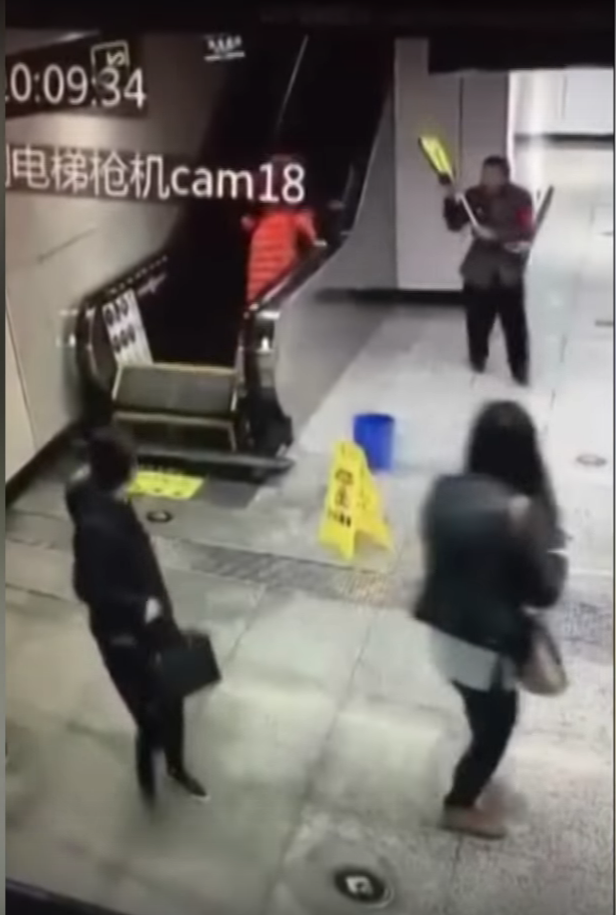 Collapsing Escalator Almost Swallowed Up Couple Again - World Of Buzz