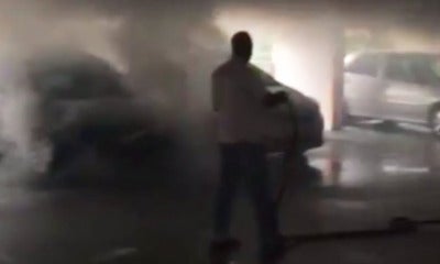 Carpark Catches Fire In Singapore, Heroic Cleaners Help Put It Out - World Of Buzz 3