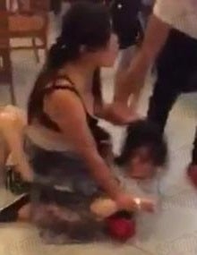 Woman Hits and Strips Mistress in Starbucks as Husband and Daughter Watches - World Of Buzz 1