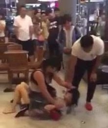 Woman Hits and Strips Mistress in Starbucks as Husband and Daughter Watches - World Of Buzz 5