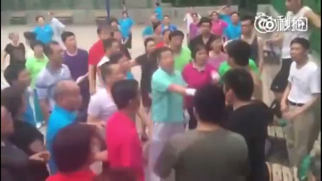 Basketball Players and Dancing Aunties Hold Turf War Over Basketball Court - World Of Buzz