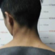 Chinese Suspect Taking Mug Shot Hilariously Reveals How He Gets 'Scratch-And-Win' Tattoo - World Of Buzz 1