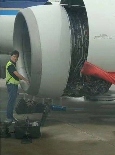 Chinese Woman Throws Coins into Plane Engine for 'Good Luck', Causes 5 Hour Delay - World Of Buzz 2