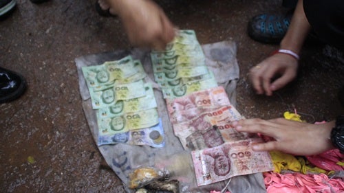 Thai Man Dies From Electrocution While Trying To Grab Envelope Full Of Cash - World Of Buzz 2