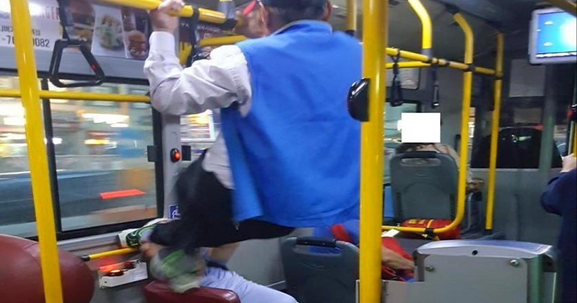 Young Person Sits On Priority Bus Seat, Old Man Kicks Him In The Face - World Of Buzz 2