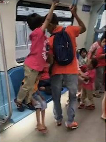 Malaysian Mother Hangs Baby Hammock In Mrt Train, Criticised By Netizens - World Of Buzz 1