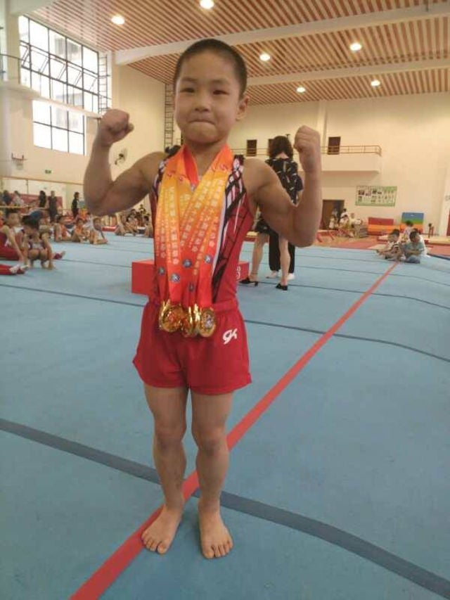 This 7-Year-Old Wows Netizens With His Eight-Pack And Gold Medals - World Of Buzz 4