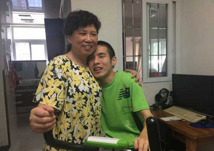 This 'Tiger Mum' Helped Her Son with Cerebral Palsy Become A Successful Translator - World Of Buzz 1