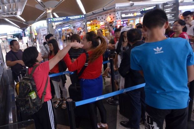 Typhoon Hato Causes Flight Disruption But Tourists in KLIA Hold Protests to Go Home - World Of Buzz