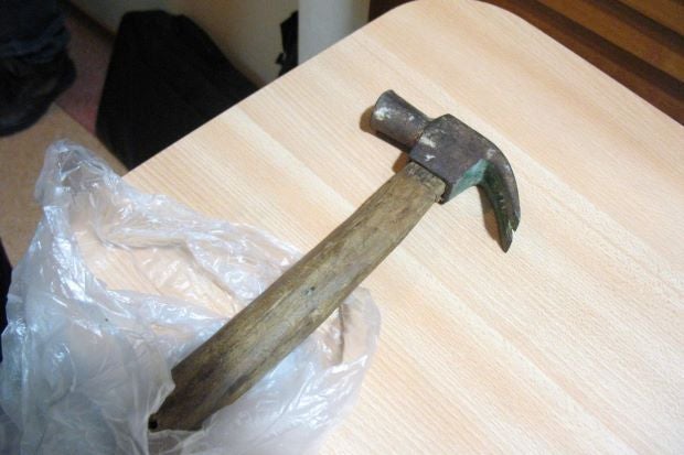Man Angry Because Nap Disrupted, Hits Wife and Children's Heads with Hammer - WORLD OF BUZZ