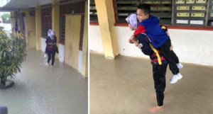 Amazing Malaysian Teacher Carries Schoolchildren Across Flood Waters To Safety - World Of Buzz 7