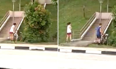 Uncivilised Couple Caught On Camera For Dumping Two Obikes In Drain For No Reason - World Of Buzz