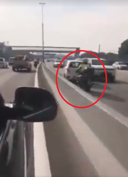 Man Drives Against Traffic on NPE in Viral Video, Even Ignores Police Warning to Stop - WORLD OF BUZZ