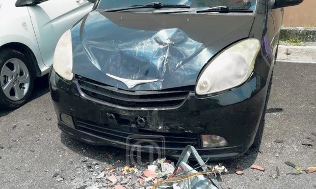 10KG Television Thrown Out of Ampang Apartment Smashes Perodua Myvi - WORLD OF BUZZ 1
