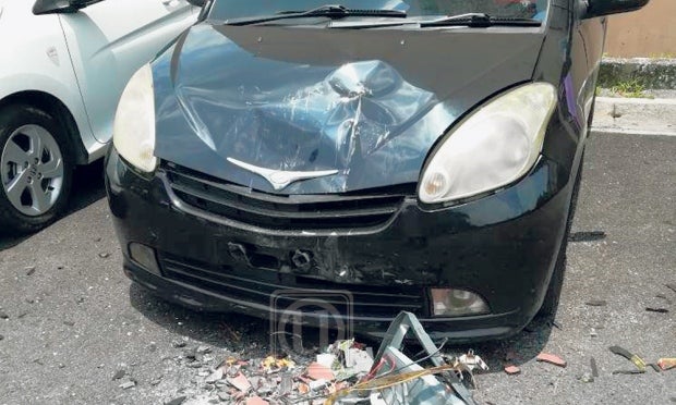 10Kg Television Thrown Out Of Ampang Apartment Smashes Perodua Myvi - World Of Buzz 1