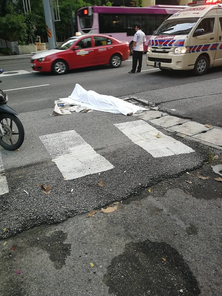 Malaysians Stood Around and Did Nothing While Man Hit by Car Slowly Died - WORLD OF BUZZ 1