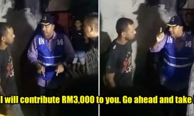 Viral Video Shows Alleged Bn Officer Bribing Foreigner With Business License And Rm3,000 - World Of Buzz
